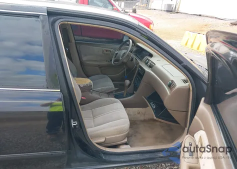 1999 Toyota Camry Ce z USA, uszkodzony, nr VIN 4T1BG22KXXU447710